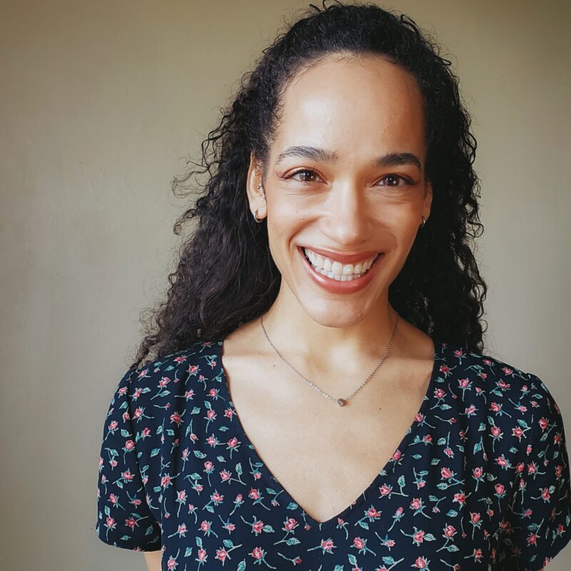 Smiling woman in floral dress