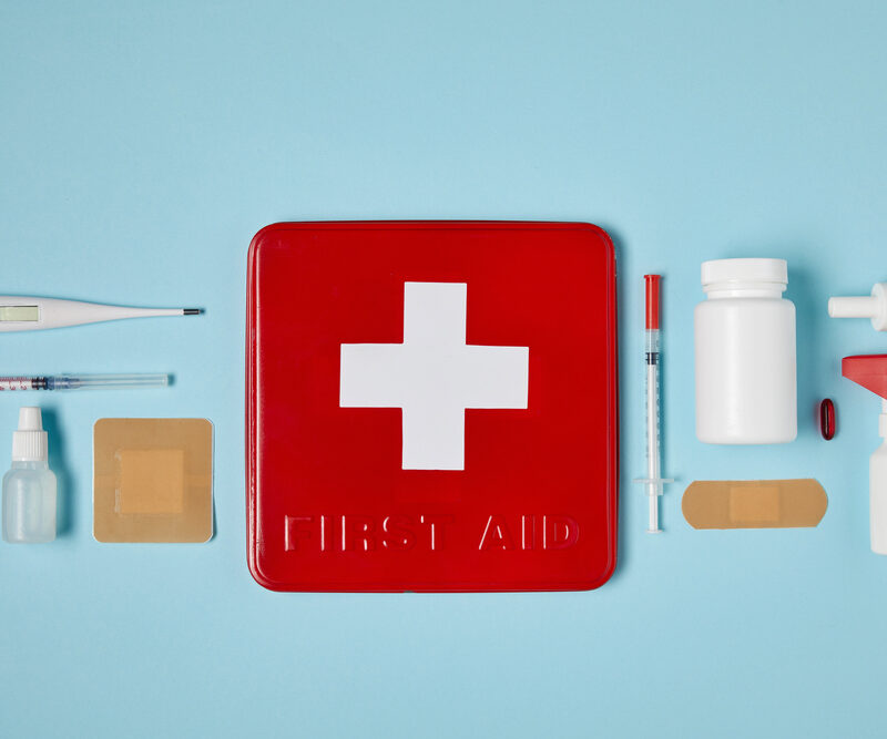emergency dentistry kit on blue background