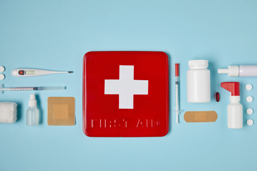 emergency dentistry kit on blue background