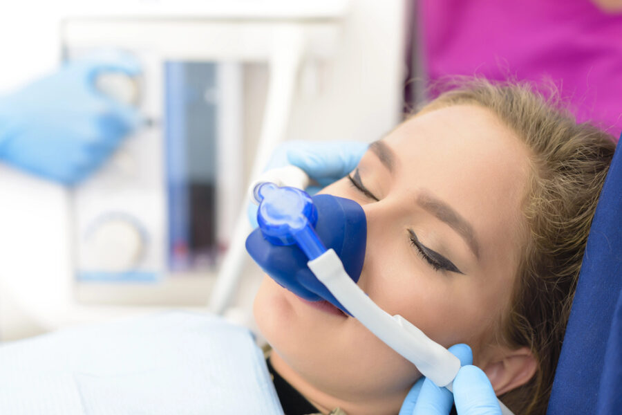 woman undergoing sedation at dentist's office