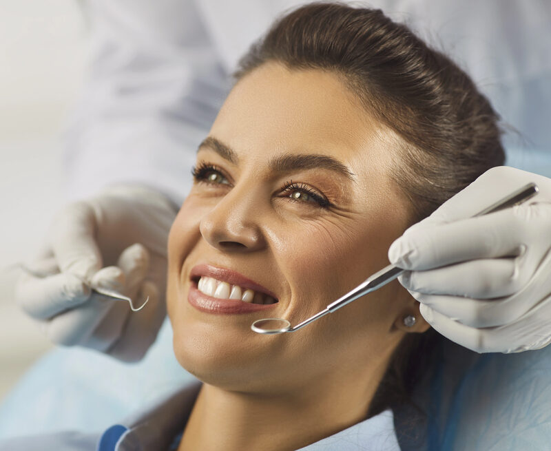 woman undergoing oral cancer screening