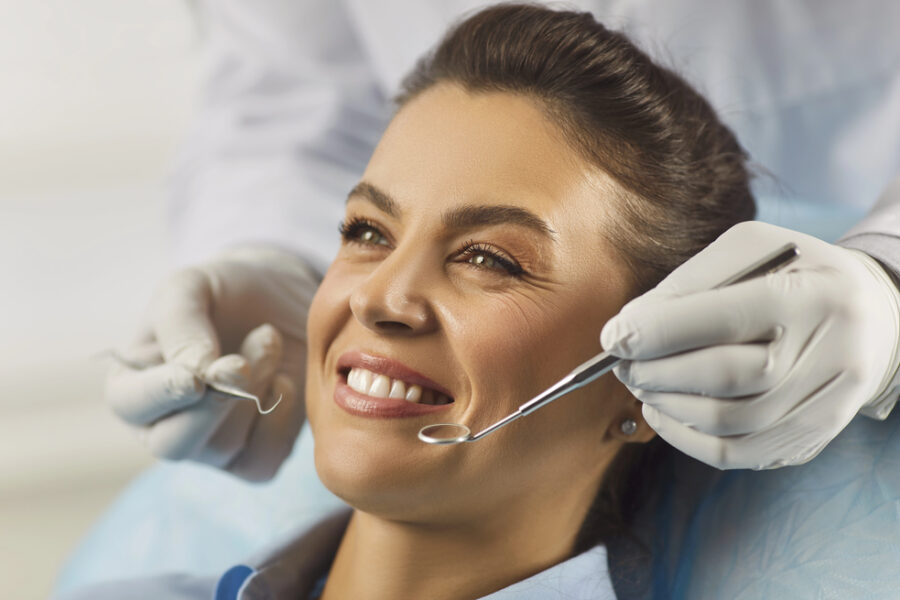 woman undergoing oral cancer screening